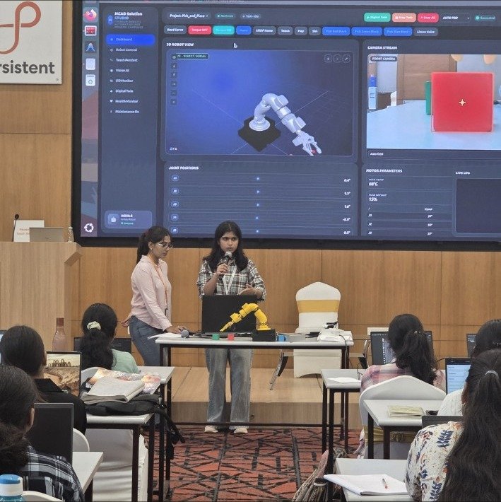 Dexter robot shown with a digital twin interface during a demonstration